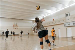 Volleyball practice in a very clean gym